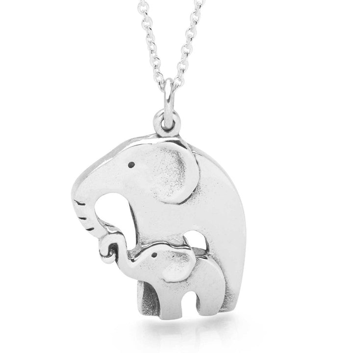 Silver necklace featuring a pendant of a mother elephant with her baby elephant, joining their trunks together.