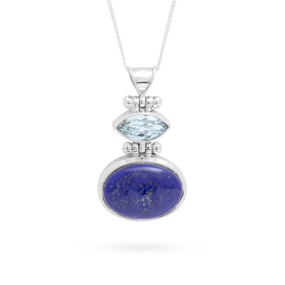 This beautiful pendant is hand crafted and combines glittering blue topaz and lapis lazuli. Matching stud earrings make this a must have set. All made in high quality 925 sterling silver