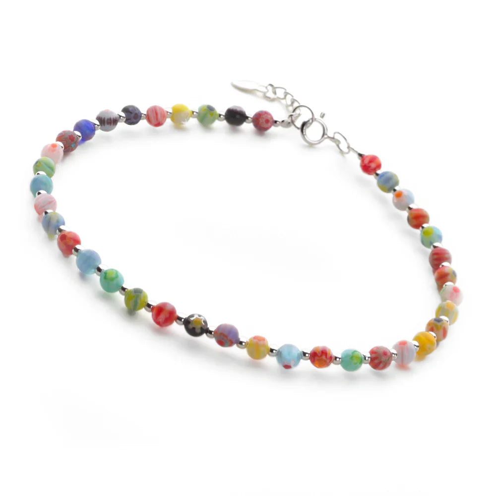 Colourful beaded necklace on a white background
