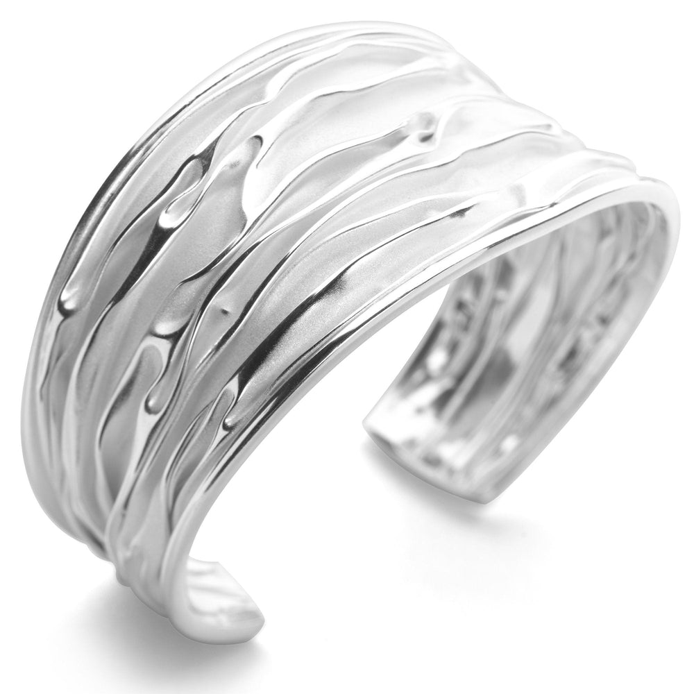 925 sterling silver bangle with silky satin depths on white background.