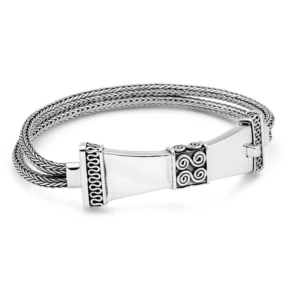 A sterling silver bracelet with a detailed Balinese wirework design and a shapely tactile clasp.