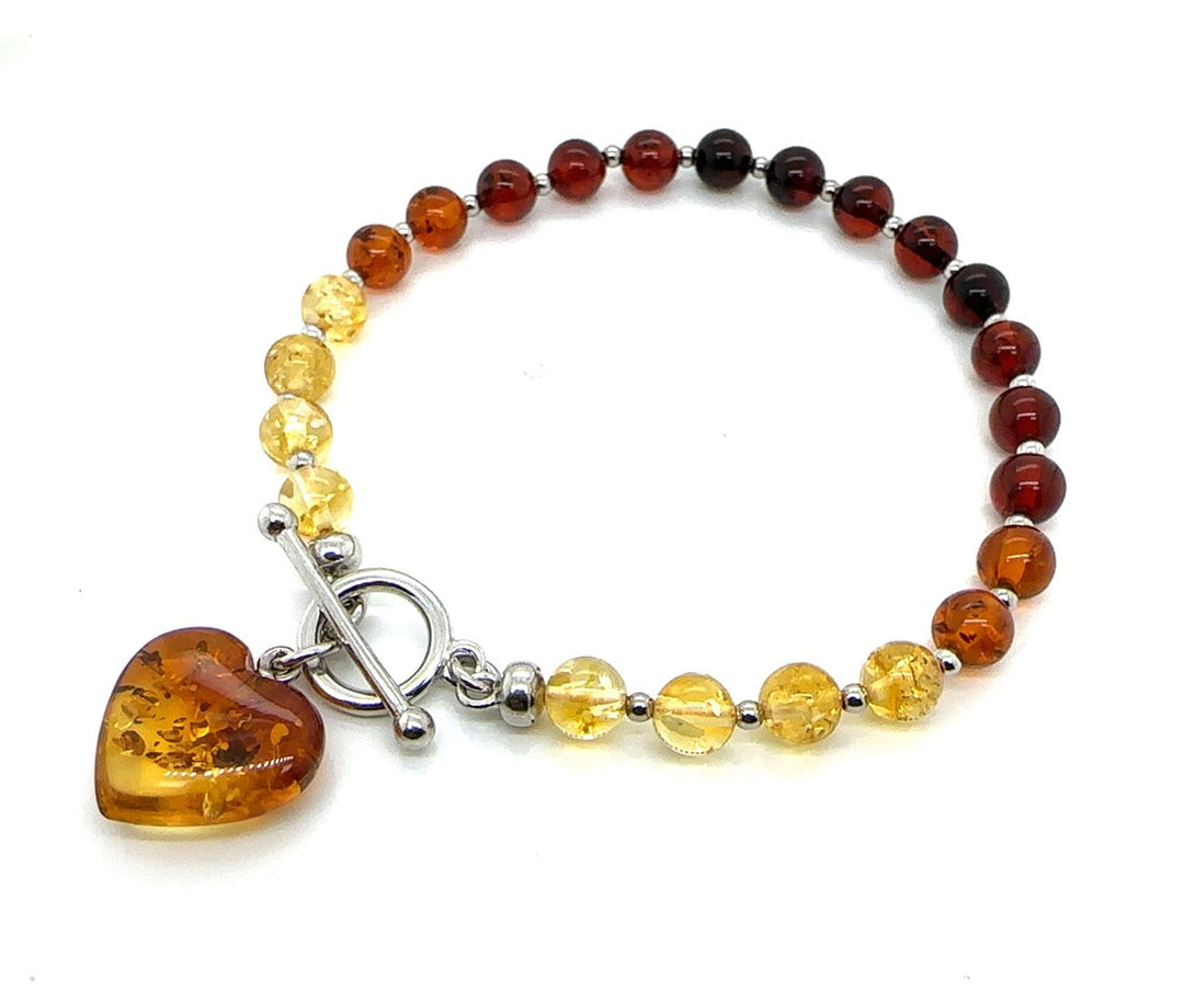 Baltic amber beaded bracelet with a heart-shaped amber charm