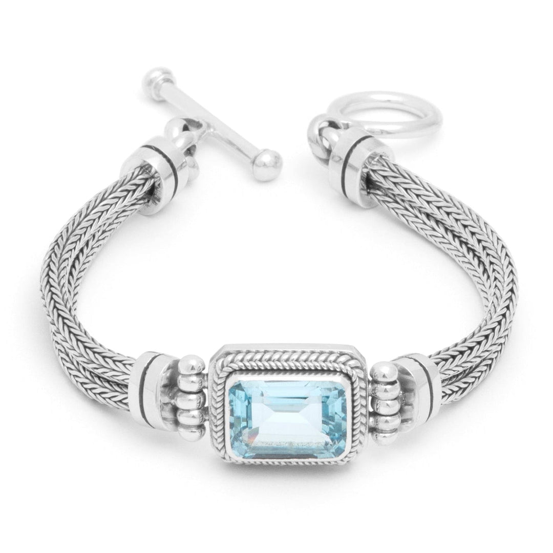 Balinese faceted blue topaz stone. Striking blue natural stone helping to make each bracelet unique.
