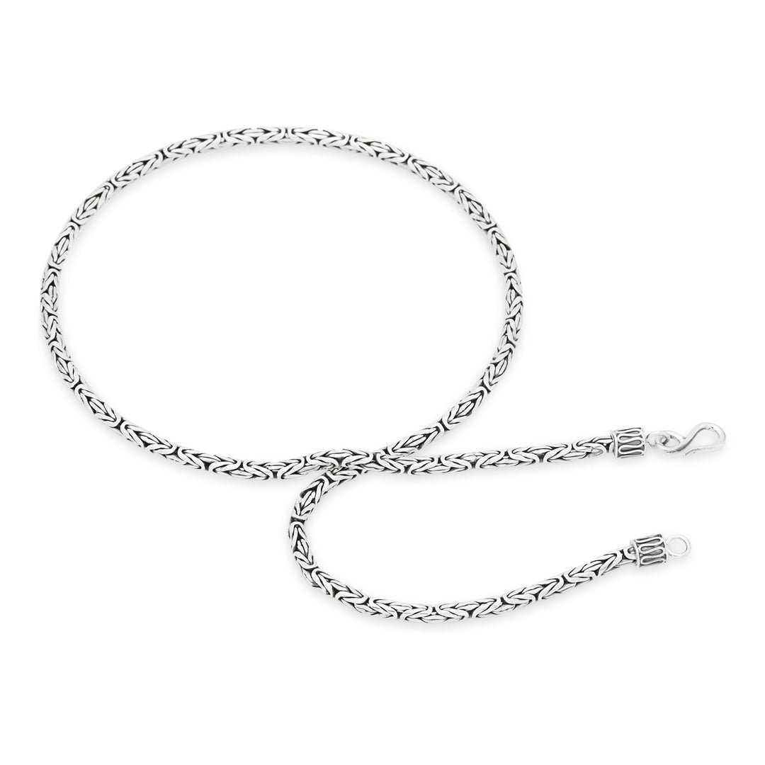A 925 sterling silver necklace with a Borobudur weave design, featuring a high polish and oxidised finish, with a chain width of 3mm and a length of 46cm including clasp.