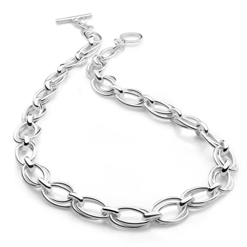 A silver necklace with a T-bar clasp and polished finish, featuring linked ovals.