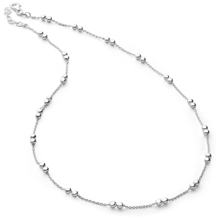 A silver necklace with beads threaded on a link chain, displayed on a white background.