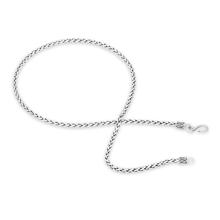 A silver chain necklace with a Padian weave design, featuring a high polish and oxidised finish, displayed on a white background.
