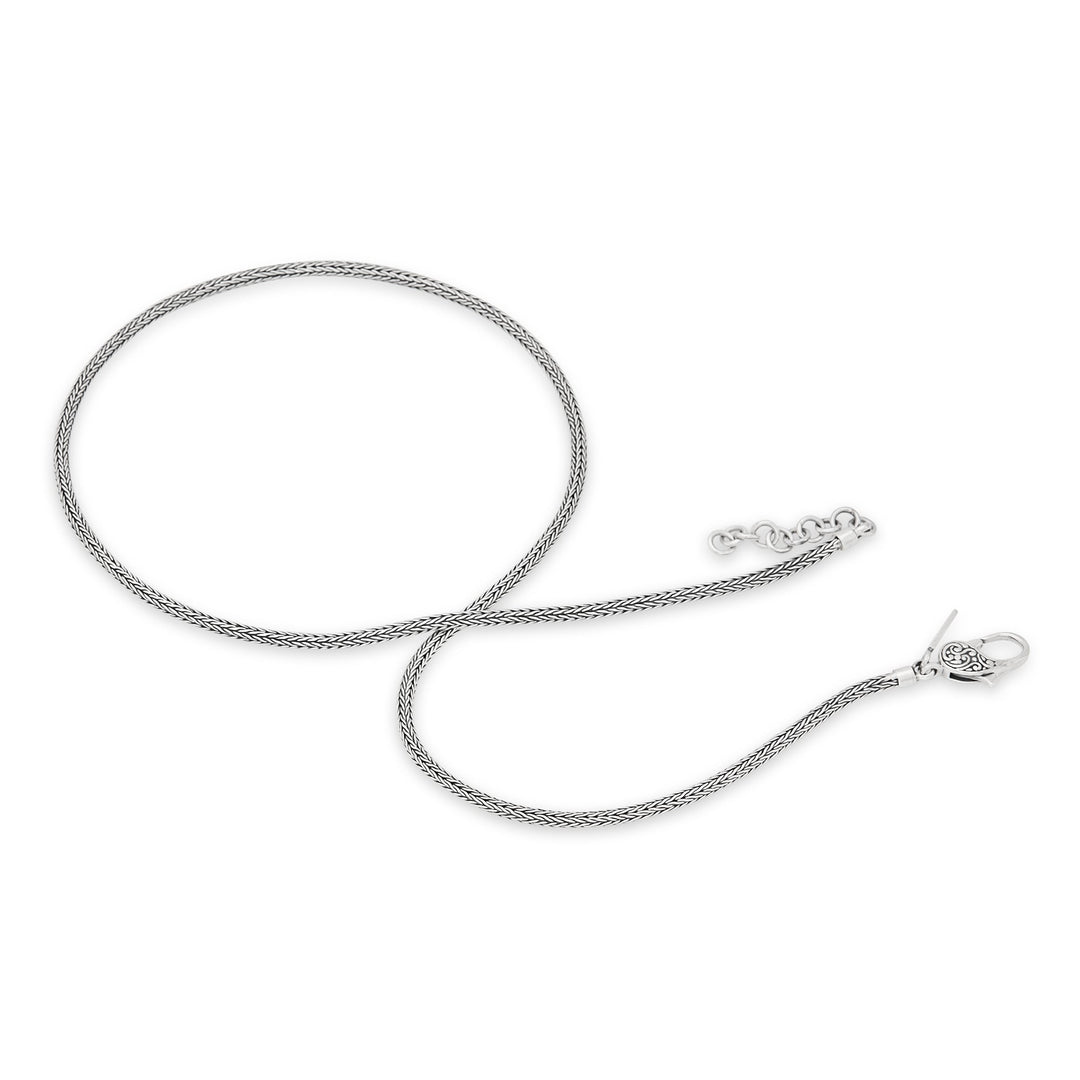 A silver necklace with a wide chain featuring a dragon bone weave design, displayed against a white background.