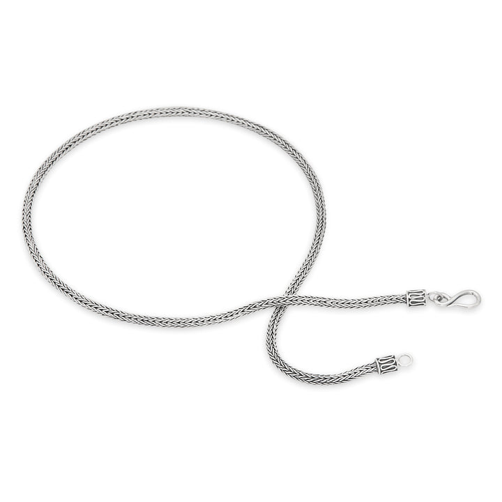 A 925 sterling silver necklace with a Tulang Naga chain design, featuring a high polish and oxidised finish.