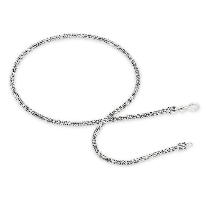 A 925 sterling silver necklace with a Tulang Naga chain design, featuring a high polish and oxidised finish.