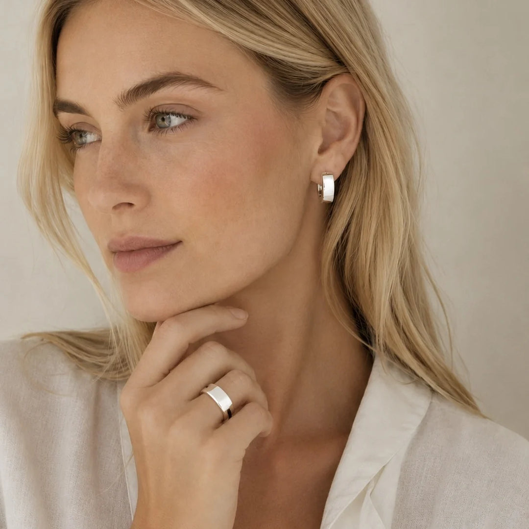 Sterling silver rectangular thick hoop earrings, clasp back, high polish finish. 