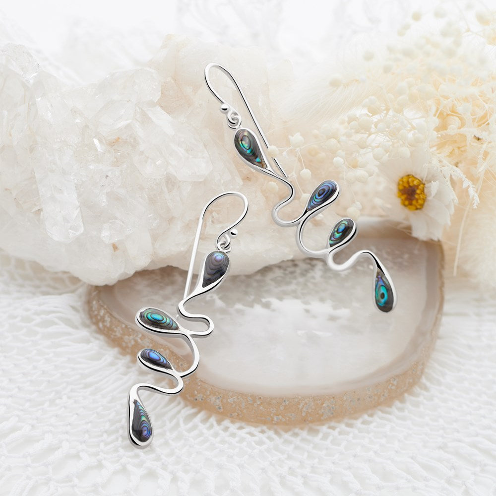 Organic squiggle of exotic falling water droplets, set with abalone shell drops, is a real head turner. Set in 925 sterling silver.