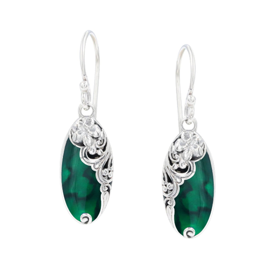 Pair of green earrings with silver hooks on a white background