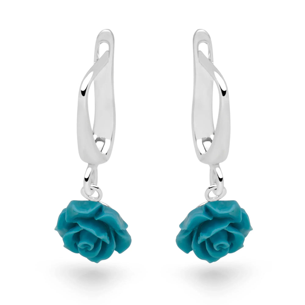 Pair of turquoise rose earrings on a white background