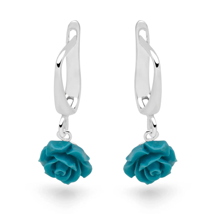 Pair of turquoise rose earrings on a white background