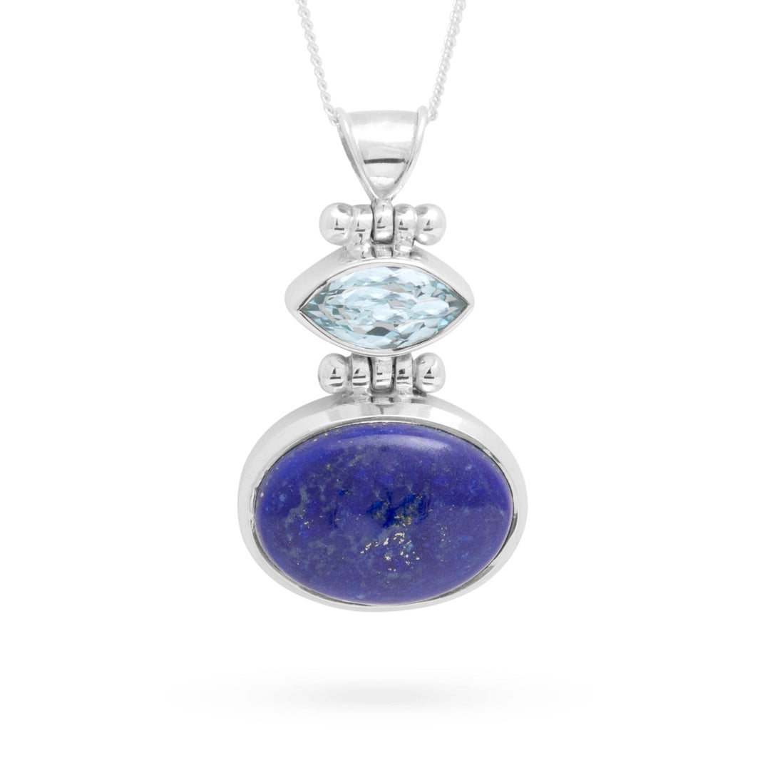 This beautiful pendant is hand crafted and combines glittering blue topaz and lapis lazuli. Matching stud earrings make this a must have set. All made in high quality 925 sterling silver