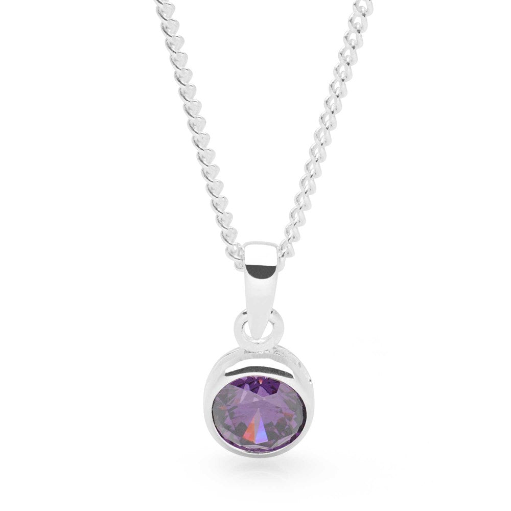 A sterling silver pendant with an amethyst-colored cubic zirconia set in a round, bezel-style setting, attached to a 40cm curb chain.