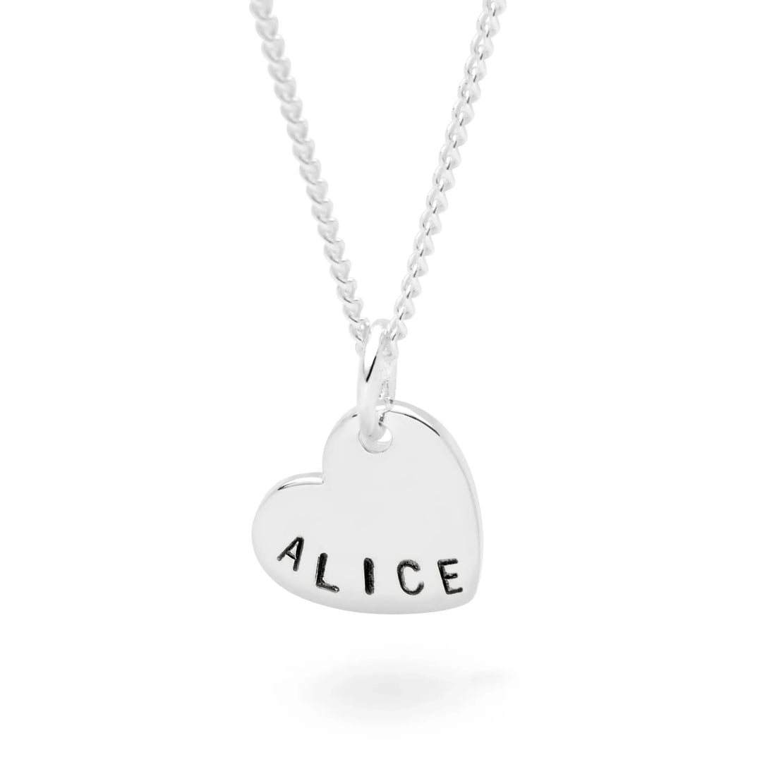 Silver heart-shaped pendant with 'ALICE' engraved on a white background
