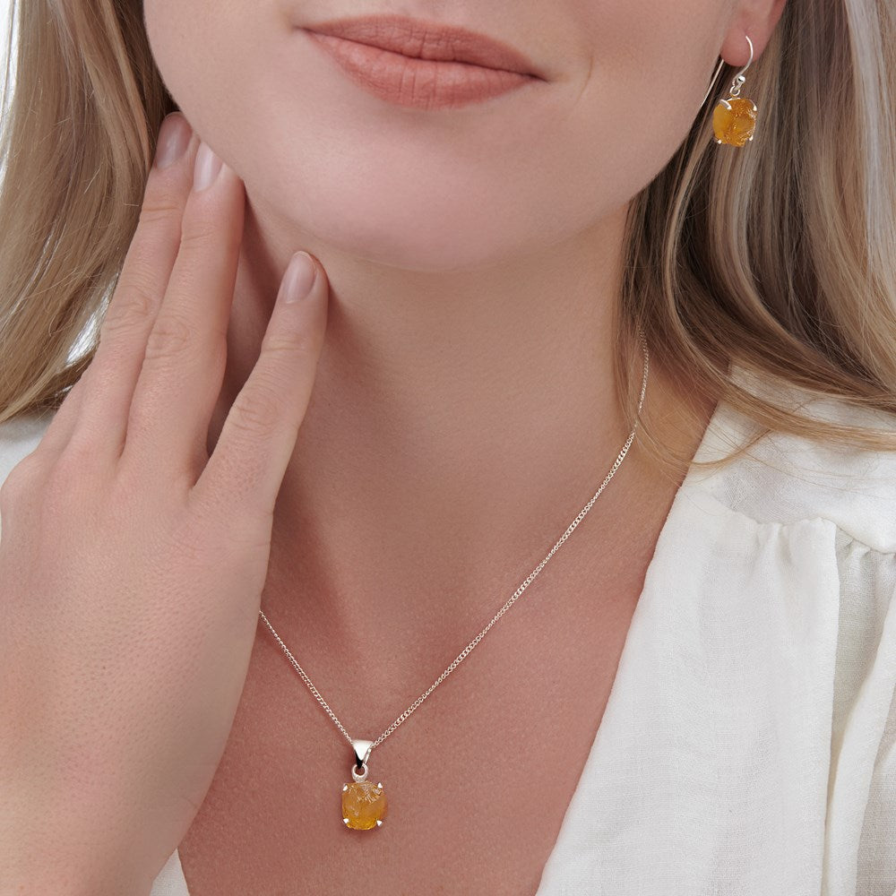 Citrine Pendant on silver 925 chain on woman model. 