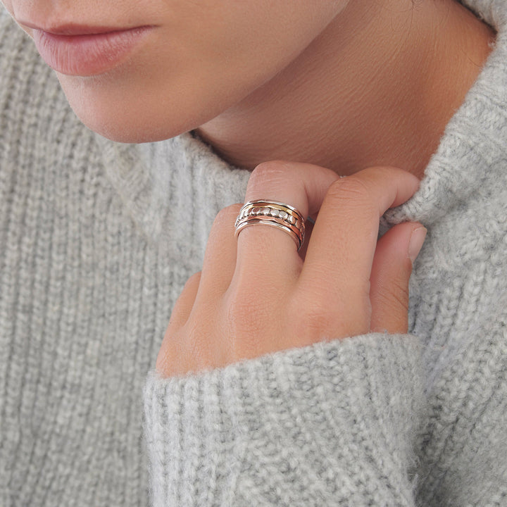 925 sterling silver spin ring with bands of silver, copper and brass plating. (R19931)