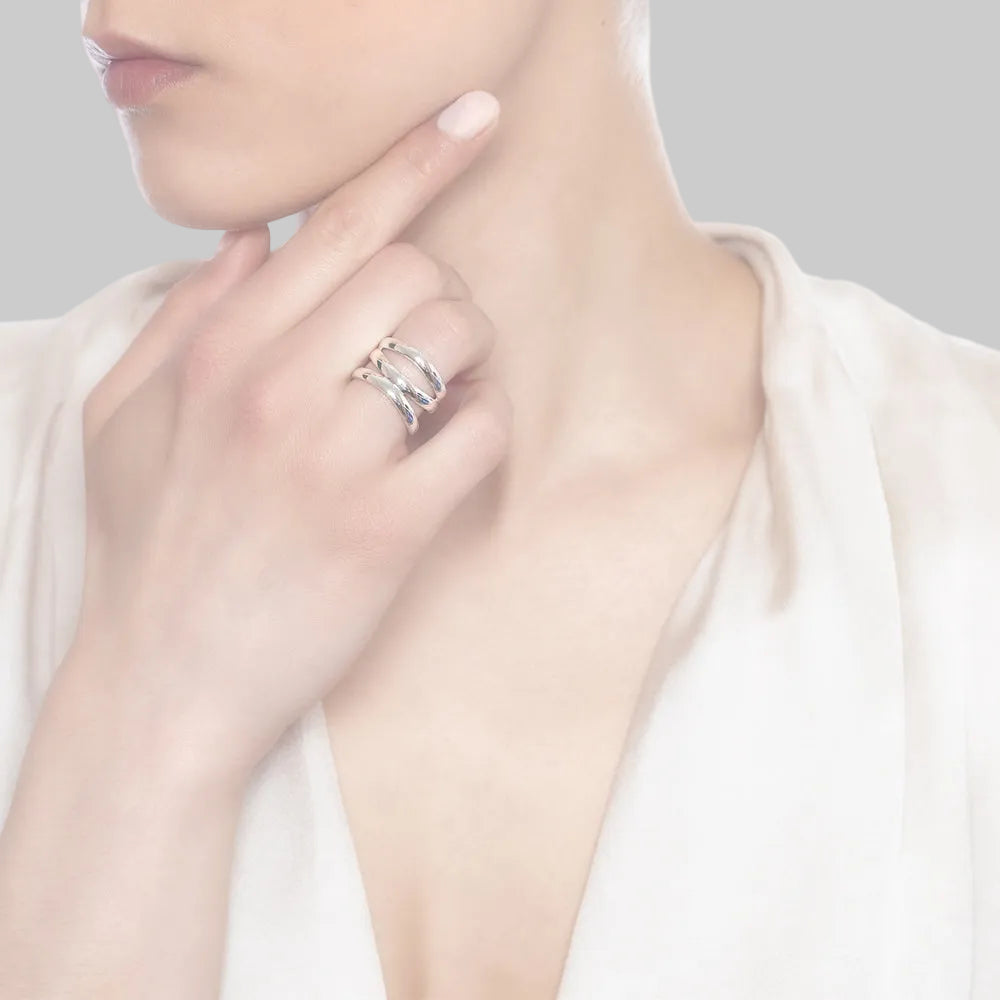 925 sterling silver circle twisted silver band ring on white background. 