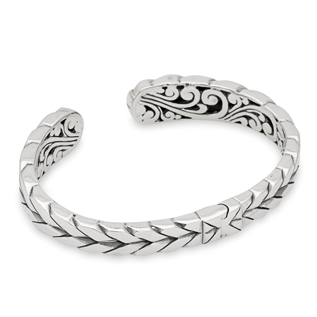 Beautiful inside and out, this Balinese bracelet has an intricate design. It is  66mm in diameter and sterling silver.