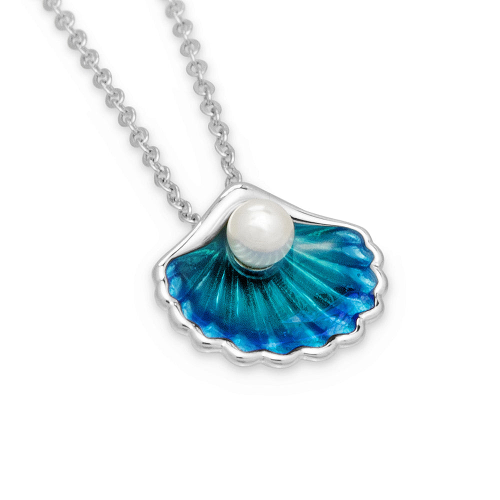 A silver shell-shaped pendant with blue enamel and a white Swarovski pearl, attached to a silver chain.